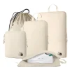 beige-nylon-compression-packing-cubes-set Epicka cream travel organizer set with packing cubes, shoe bag, and drawstring pouch