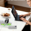 Dual USB-C fast charging travel adapter powering phone and laptop simultaneously.