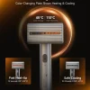 safety-dual-voltage-global-travel-garment-steamer Handheld steamer with visible color-changing heat indicator, fast heat-up, and auto shut-off safety.