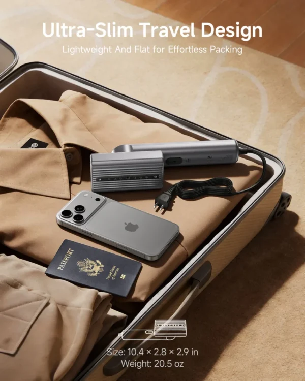 ultra-slim-dual-voltage-global-travel-garment-steamer Ultra-slim portable travel garment steamer packed in suitcase with shirt, iPhone, and passport.